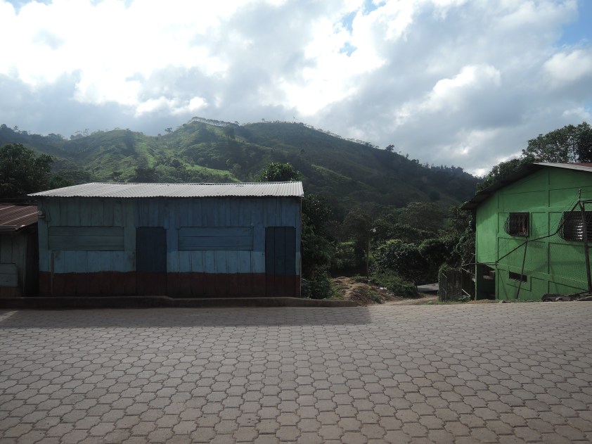 Looking over the cobbled main street towards the Sandinista flagged hill.