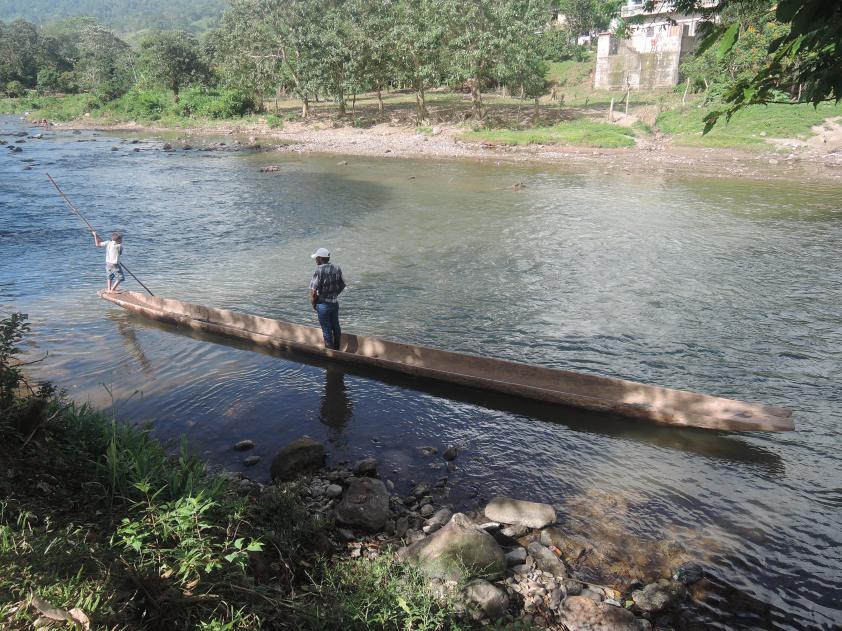 The gentleman and canoe that provided us with a safe crossing of Rio Bocay.